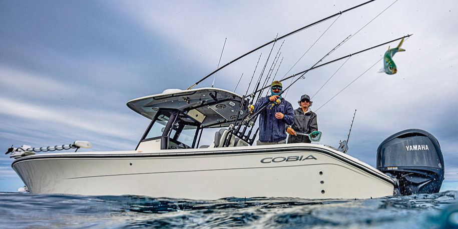 two men fishing on boat