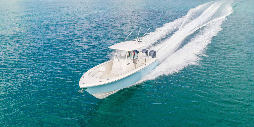 Cobia 301 Center Console with Yamaha Twin Engines running.